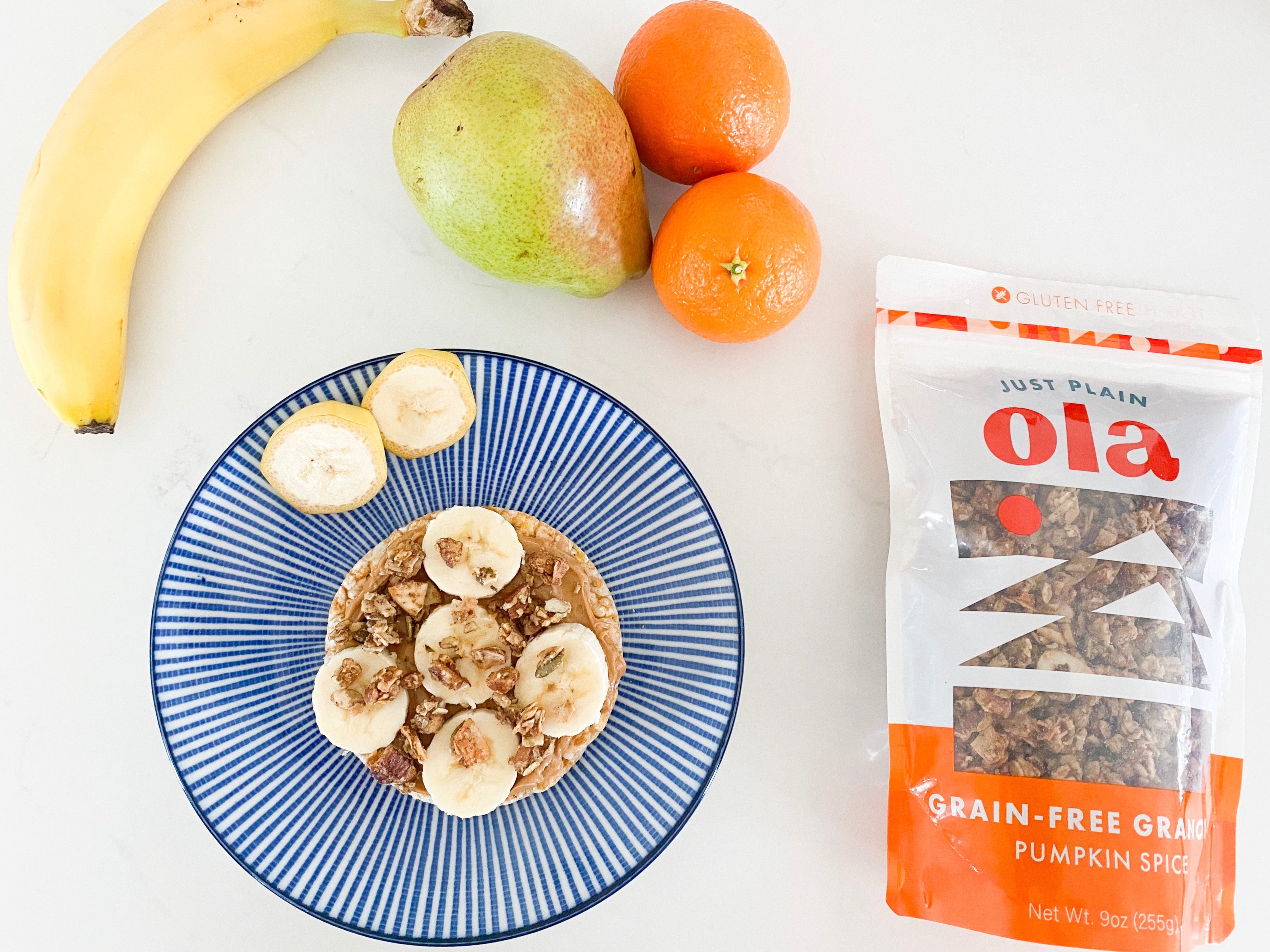 A peanut butter banana snack topped with pumpkin spice Just Plain Ola.